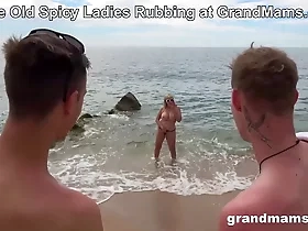 GrandMams enjoys a steamy threesome with multiple horny men on the beach